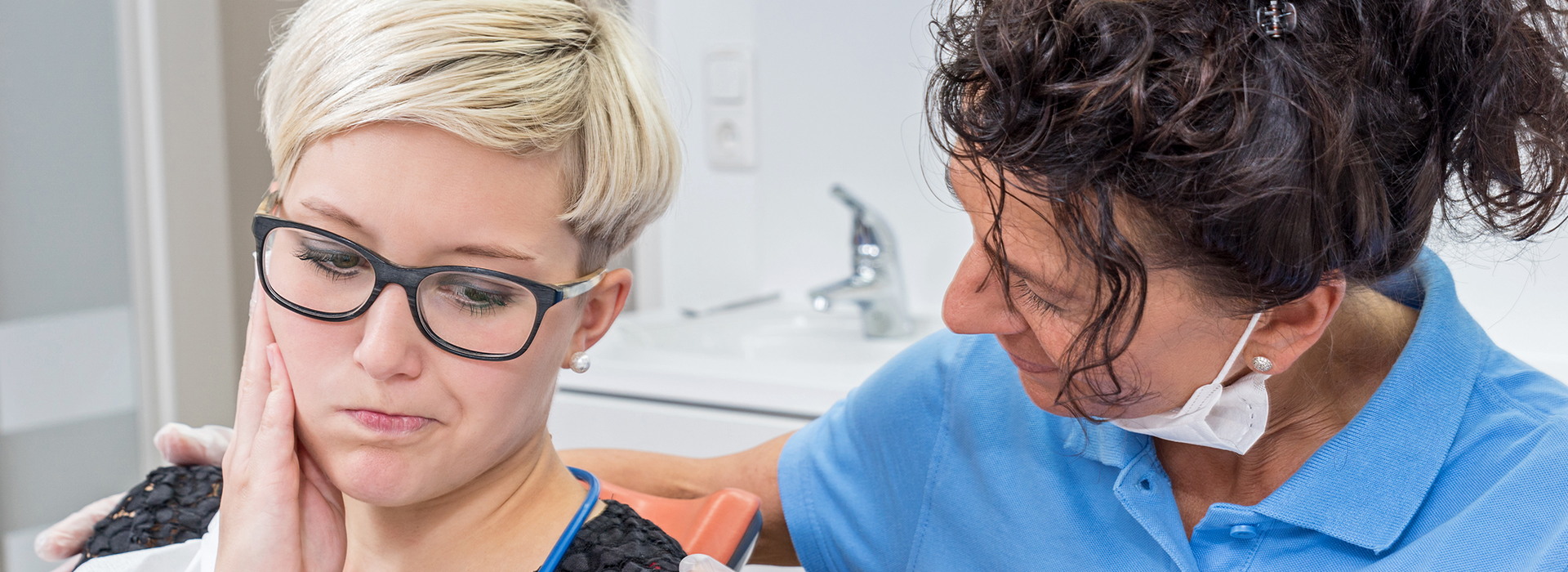 A split-screen photograph showing a woman receiving dental care from a professional, with one half of the image depicting the patient in a chair with a mask on her face, and the other half featuring the dentist, who is attentively examining the patient s teeth.